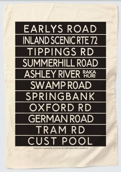 Cust tea towel: beige organic cotton printed in black with Earlys Road, Inland Scenic Rte 72, Tippings Rd, Summerhill Road, Ashley River / Raka Huri, Swamp Road, Springbank, Oxford Rd, German Road, Tram Rd and Cust Pool.