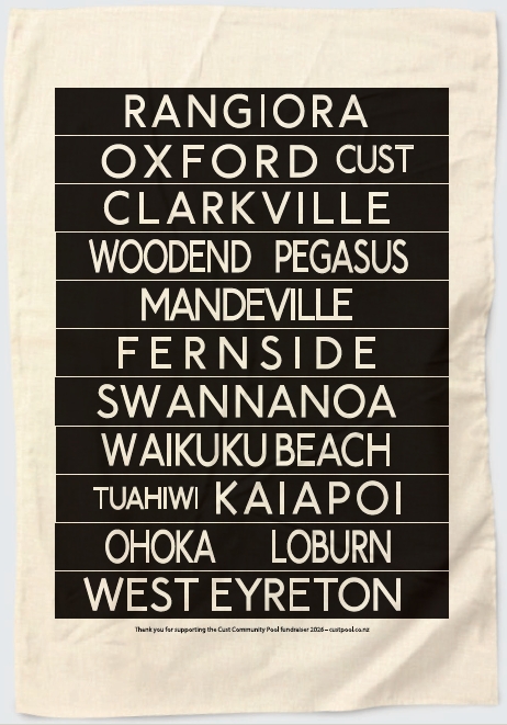 The Townships tea towel: beige organic cotton printed in black with North Canterbury place names, in the style of a vintage destination board.
